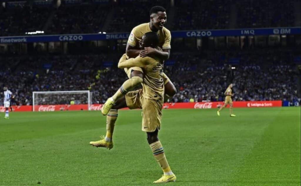 Ansu Fati và Ousmane Dembele ăn mừng bàn thắng của Barcelona vào lưới Real Sociedad ở Tuần 2 Giải VĐQG Tây Ban Nha 2022/2023, sáng sớm thứ Hai (22/8/2022) theo giờ WIB. (c) Ảnh AP